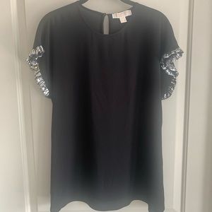 Michael Michael Kors black top with sequin sleeves